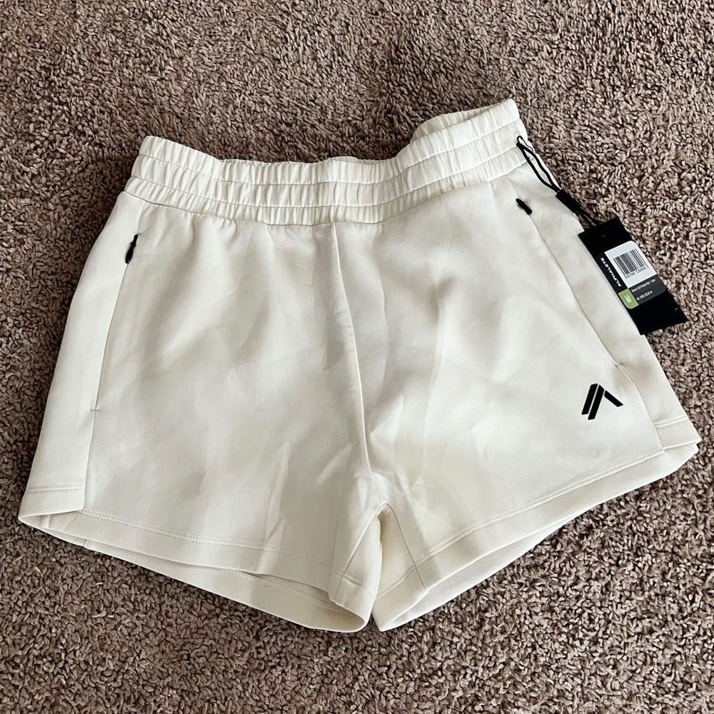 Women’s Alphalete ELMTS shorts, cream, sz medium, brand new